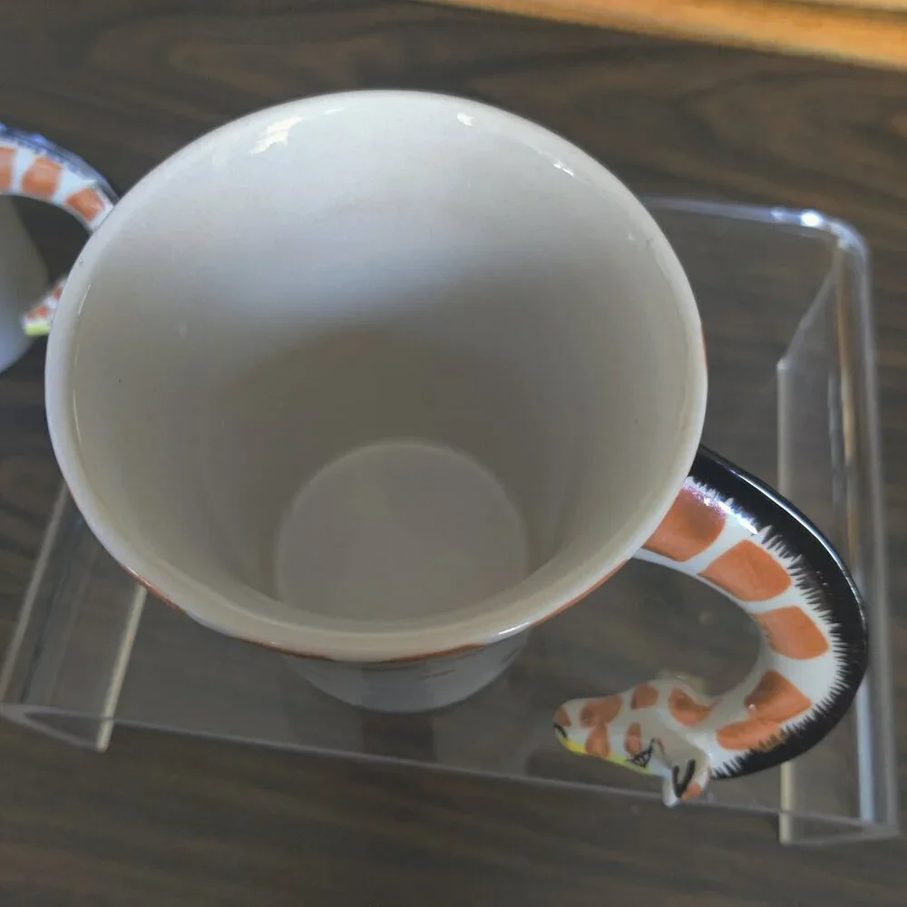 Pier One Giraffe Coffee Mug (2 avail) A 3D giraffe whose neck is a coffee handle